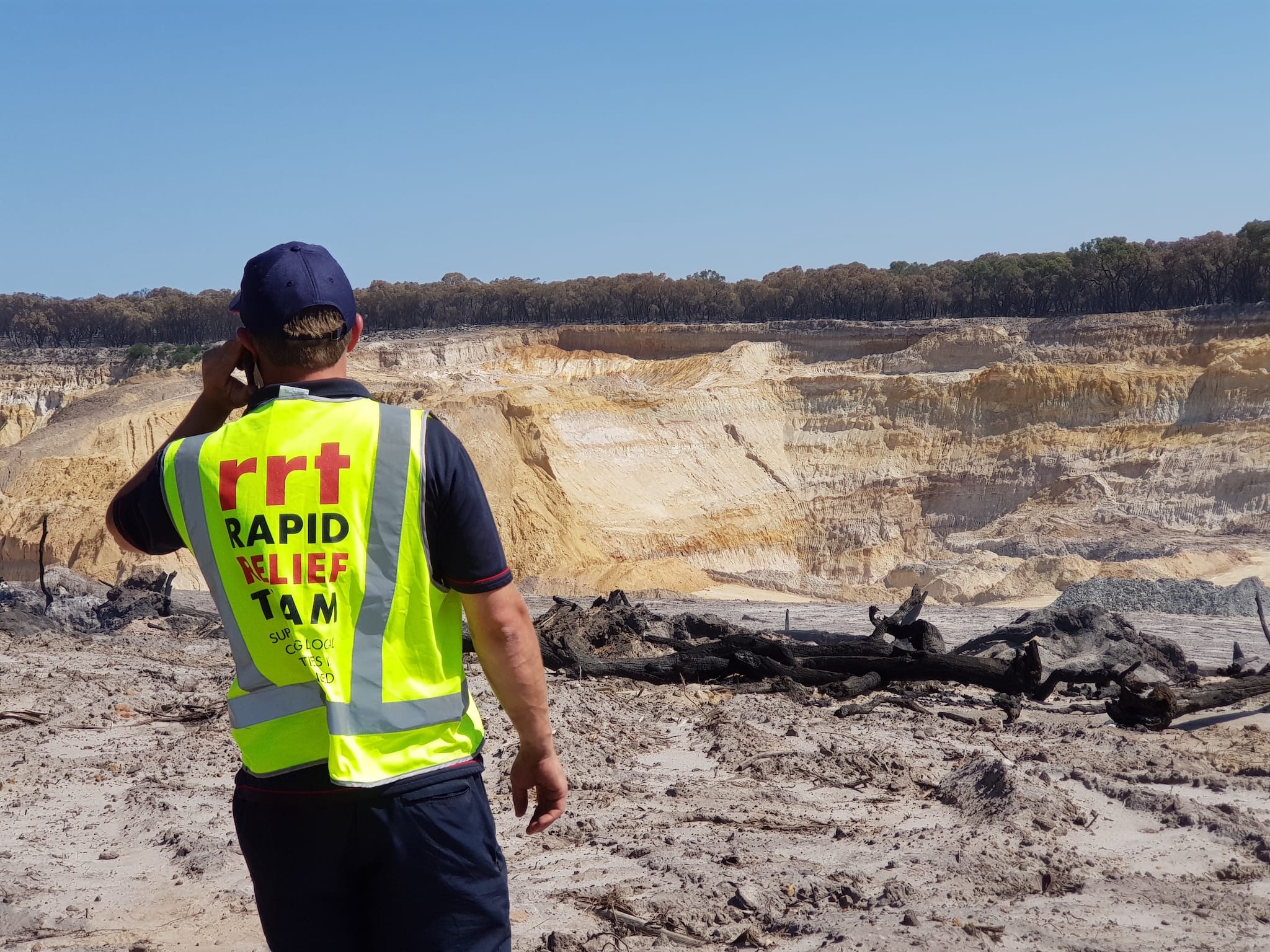 spaceful-team-working Individual overlooking work construction site.