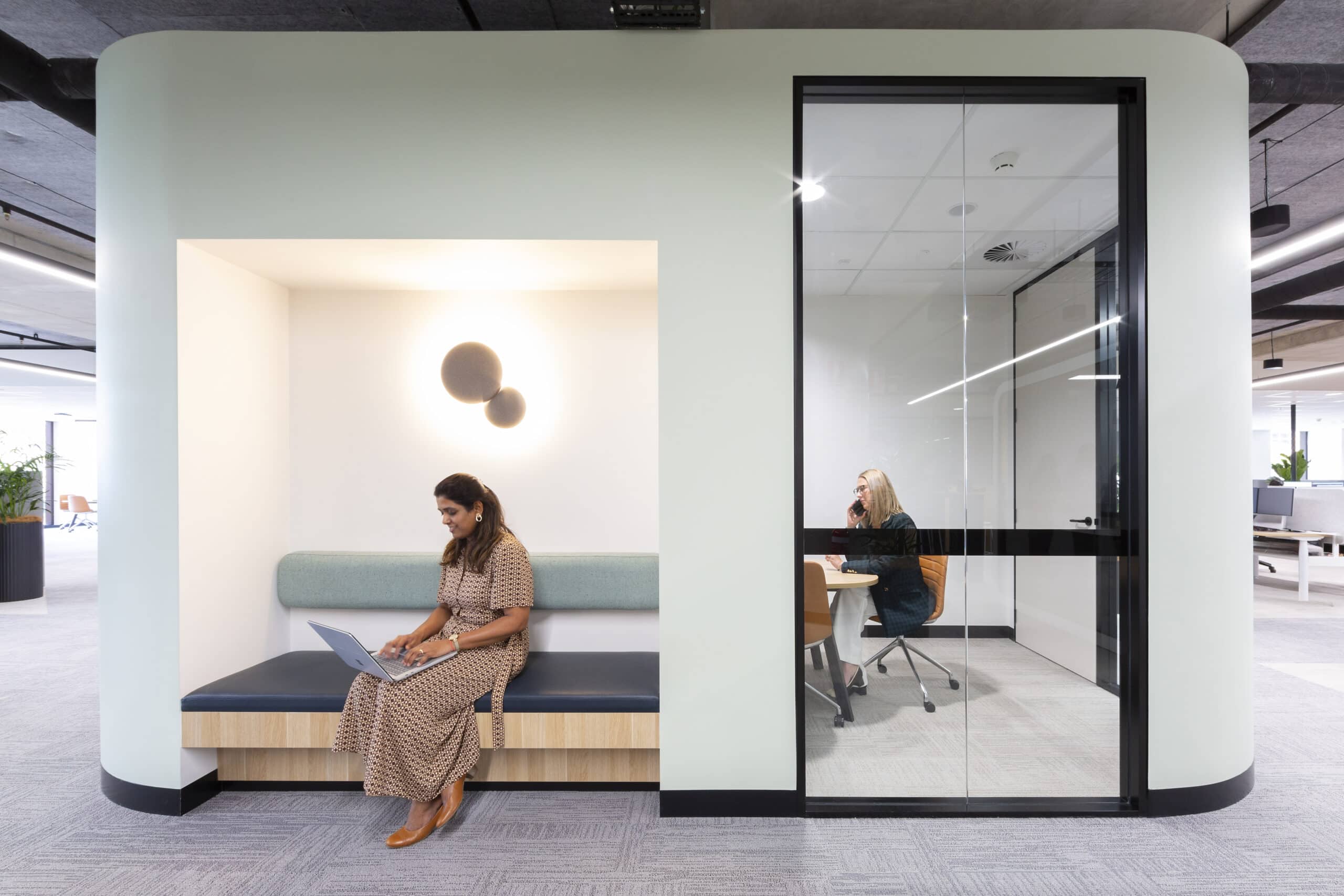 A contemporary workspace featuring ergonomic furniture, ample natural light, and a well-designed layout that promotes productivity and creativity.